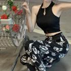 Halter-neck Cutout Cropped Tank Top / High-waist Floral Printed Wide-leg Pants