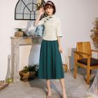 Set: Patterned 3/4-sleeve Qipao Top + Midi A-line Skirt