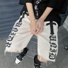 Cross Letter Print Frayed Denim Shorts