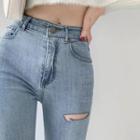 Mid Rise Cutout Skinny Jeans