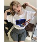 Short-sleeve Cartoon Print T-shirt / Pleated Mini A-line Skirt