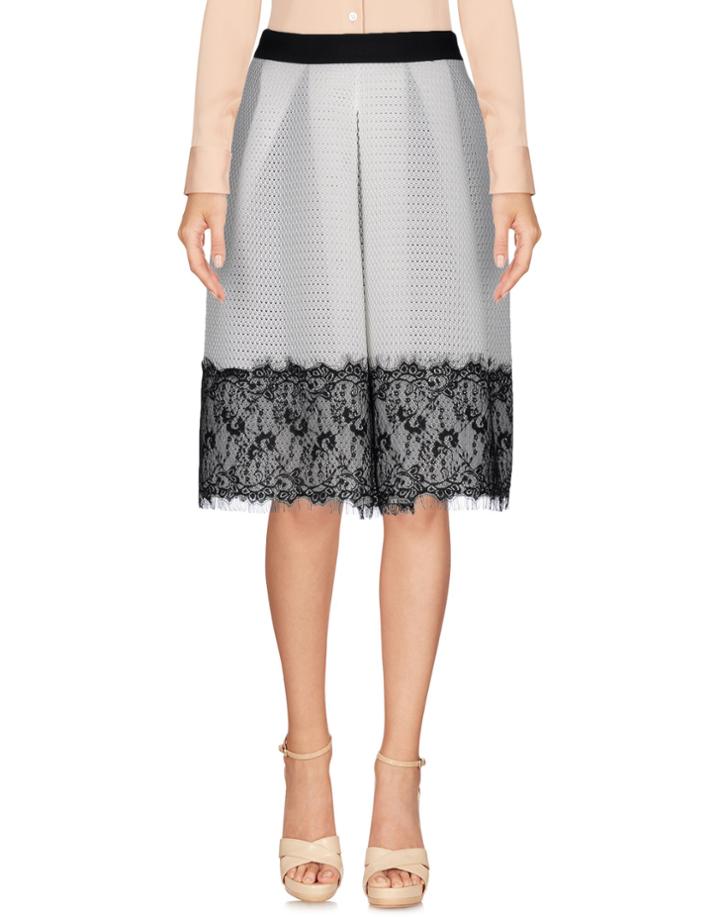 Till. Da Knee Length Skirts