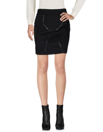 Andrew Mackenzie Mini Skirts