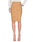   Magia. Knee Length Skirts