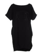 Paola T. Short Dresses