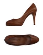 Akua Pumps