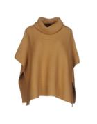 Scaglione Capes & Ponchos