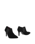 Nadia C. Booties