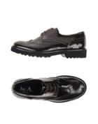 By A. Lace-up Shoes