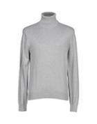 B. & K. Turtlenecks