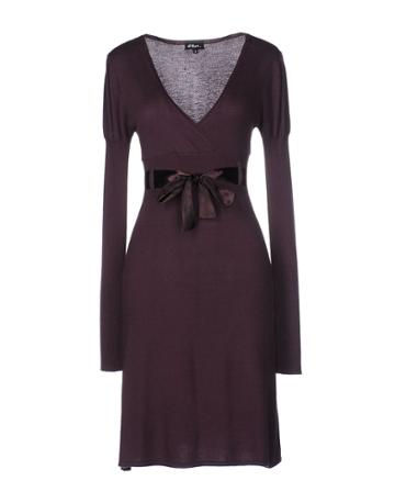   Magia. Short Dresses