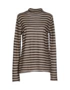 Mal Parmi Turtlenecks