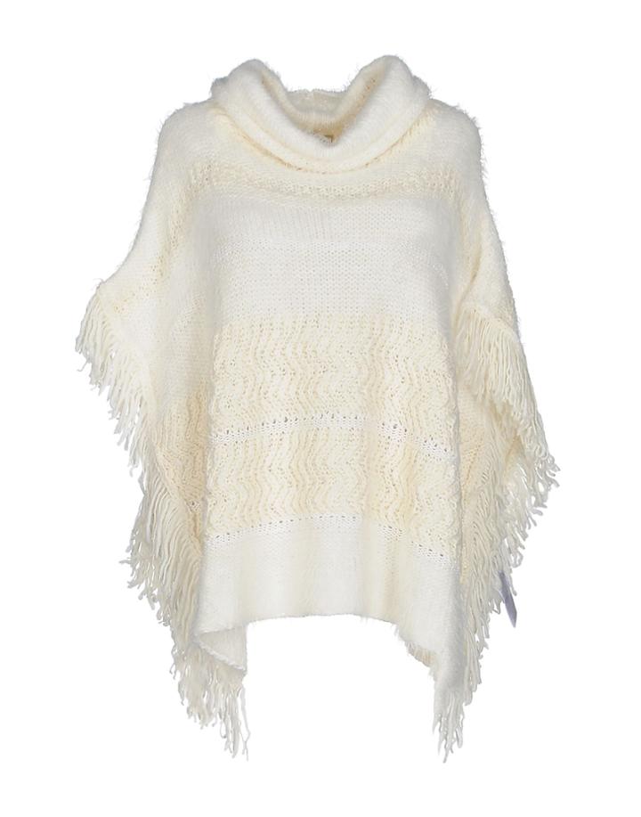 Annarita N. Capes & Ponchos