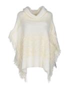 Annarita N. Capes & Ponchos